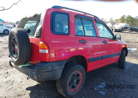 2002 Chevrolet Tracker Hard Top Base z USA, uszkodzony, nr VIN 2CNBE13C326917199